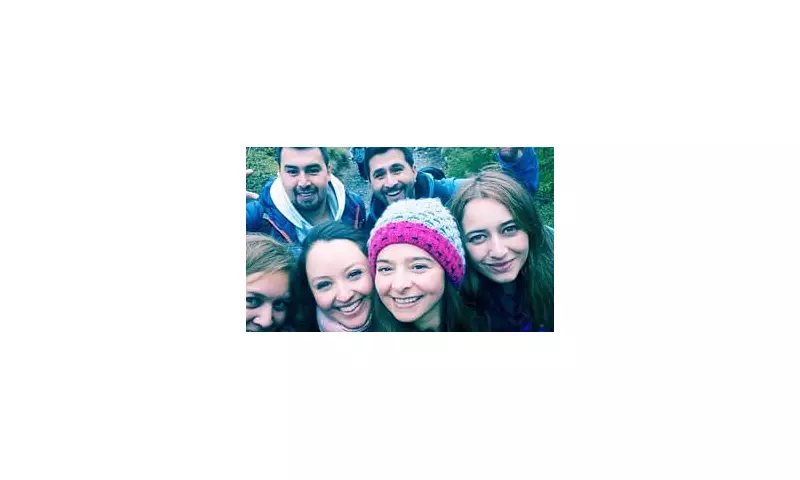 Eerie 'Ghost' Spotted in Group Photo – Can YOU See It?