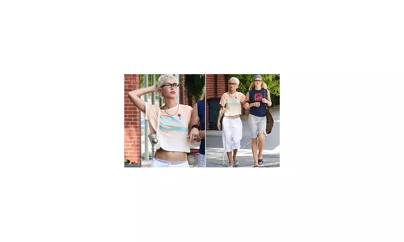 Iris Law Stuns in NYC with Edgy Slogan Tee and Chic Capri Pants