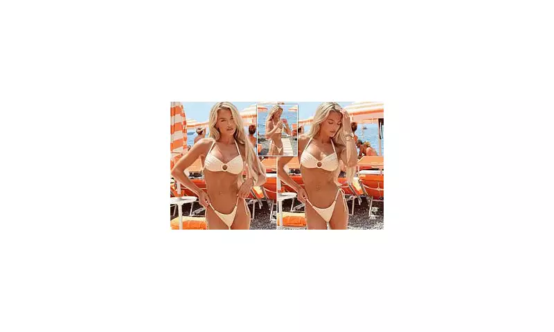 Molly Smith Flaunts Washboard Abs in Skimpy Bikini During Italian Getaway