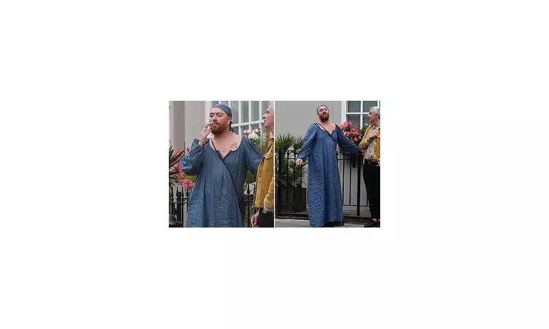 Sam Smith Stuns in Navy Gown & Puffs Cigarette Ahead of New Single Release in Notting Hill