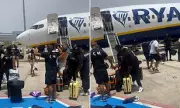 Chaos at Tenerife Airport: Drunken Stag Party Brawl Halts Flight to Stansted