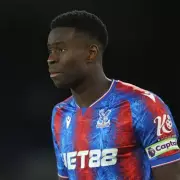 Liverpool and Tottenham Battle for Crystal Palace Star Marc Guehi in High-Stakes Transfer Saga