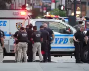 NYPD Officer Shot in Manhattan: Suspect in Custody After Dramatic Standoff