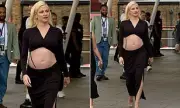 Pregnant Pixie Lott Stuns in a Slinky Black Two-Piece as She Flaunts Her Growing Baby Bump