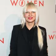 Sia, 49, Stuns in Tiny Bikini as She Shows Off Toned Abs in Sizzling Beach Snap