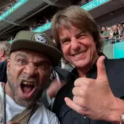 Tom Cruise Rocks Out to Oasis at Glastonbury in Surprise Appearance