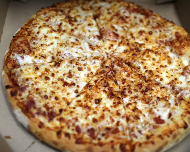 Domino's Pizza Profits Plummet as Brits Tighten Belts on Takeaways