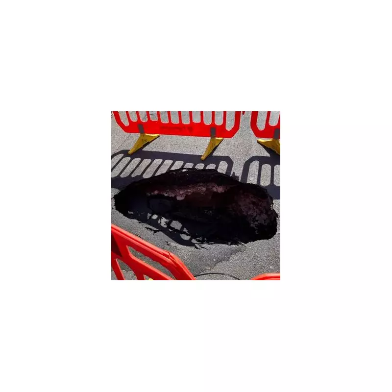 Giant Sinkhole Swallows Road in Westminster: Chaos as Emergency Crews Rush to Scene