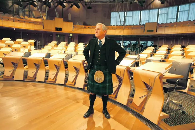 John Swinney Recalls Michael Buerk's Live Aid Broadcast as Defining Moment in Scottish Parliament Speech