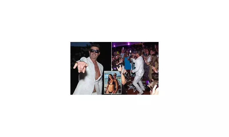 Robin Thicke Serenades Adoring Fans During Hamptons Honeymoon with April Love Geary