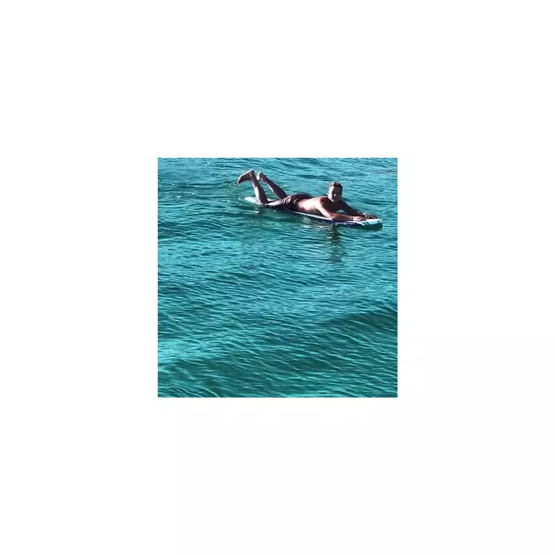 Surfer's Terrifying Shark Encounter: Heart-Stopping Footage Shows Ocean Predator Inches Away