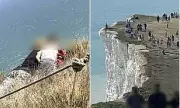 Cliff-Edge Catastrophe: Reckless Tourists Risk 500ft Plunge in Heart-Stopping Footage