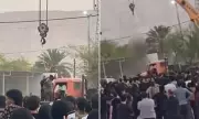 Iran's Sharia Justice: Chilling Moment Killer Executed by Crane as Crowds Cheer