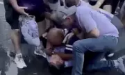 Kansas State QB Avery Johnson's Father in Wild Parking Lot Brawl After College Football Game | Exclusive Video