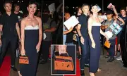 Katy Perry Stuns in Vibrant Orange with a £10k Hermès Kelly Bag – See Her Bold Look!