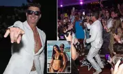 Robin Thicke Serenades Adoring Fans During Hamptons Honeymoon with April Love Geary