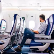 The Ultimate Armrest Etiquette Guide: Who Really Gets the Middle Seat Perk?