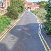 Wonky Yellow Lines Spark Outrage in Quaint Norfolk Village – Council Blames 'Human Error'