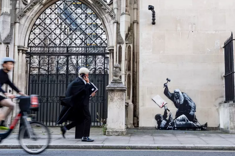 Banksy's Latest Stunt: Artwork Scrubbed From Royal Courts of Justice In Broad Daylight
