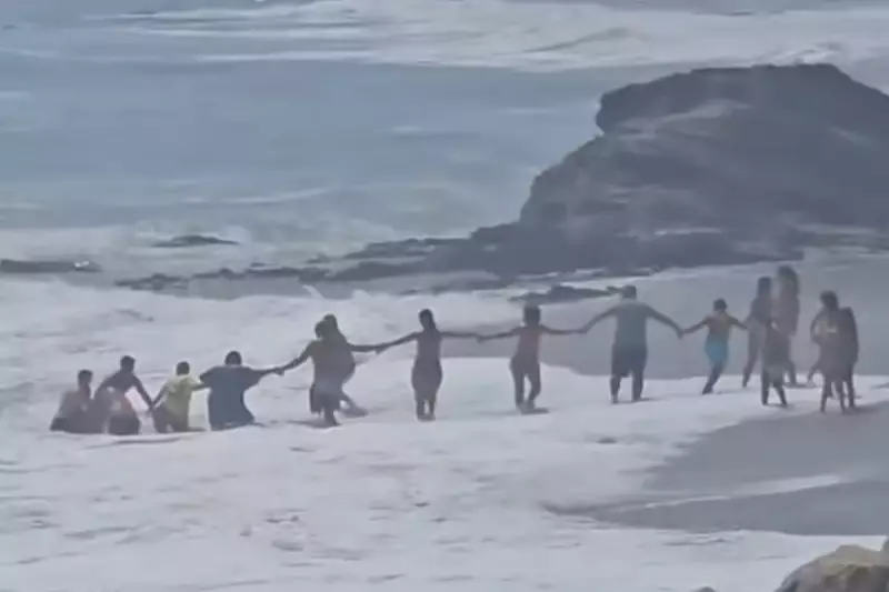 Human Chain Saves Boy from Drowning on Spanish Beach in Dramatic Rescue