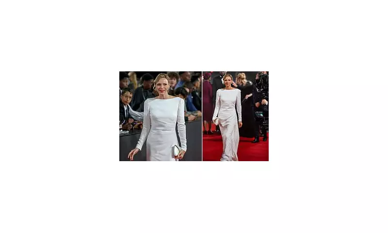 Princess Charlene of Monaco's Radiant Return: A Vision in White at Prestigious Ballon d'Or Ceremony