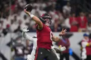 Baker Mayfield Stuns in Buccaneers Debut as Texans Edge Raiders in Thrilling NFL Opener