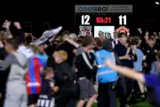 Grimsby Town Fined £15,000 by EFL for FA Cup Pitch Invasion Against Manchester United