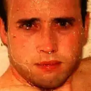 Haunting Photo Shows Man Showering Beside Grim Reaper Mural in Drought-Stricken Mexico City | Mirror