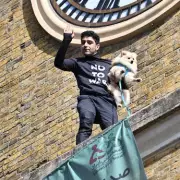 King's Cross Chaos: Just Stop Oil Activist Scales Roof in Major London Protest