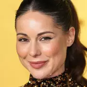 Louise Thompson's Knee-High Boots Spark Fashion Frenzy Amid Health Battle | Exclusive