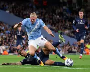 Man City Edge Past Napoli in Champions League Thriller: Foden Shines in Five-Goal Epic