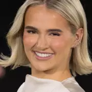 Molly-Mae Hague's Parisian Stroll: Lovebirds Spotted in Romantic Getaway Amidst Tommy Fury Speculation