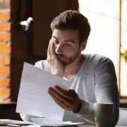 Mysterious 'Wine Rack' Appears on Resident's Wall: Baffling Letter from Management Company Sparks Confusion