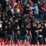 Riot Police Storm Birmingham as Football Violence Erupts After England's Defeat