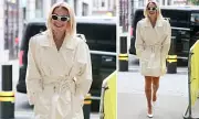 Rita Ora Stuns in White Trench Dress for Sister's Night Out, Drawing Comparisons to Kylie Minogue