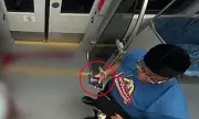Shocking Video: Bystanders Confront Ukrainian Refugee Mother After She Allegedly Dragged Son Near Moving Train in North Carolina