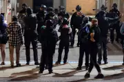 Trump's Portland 'Secret Police' Sparks Outrage: Unmarked Officers Detain Protesters in Alarming Escalation