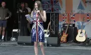 Union Jack Dress Ban: Schoolgirl Excluded for Patriotic Outfit Meets Tommy Robinson at Anti-Migrant Protest