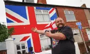 Union Jack Protest: Neighbour's Patriotic Stand Against Illegal Immigration in Quiet UK Street