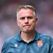 Wrexham's Championship Dream: Parkinson's Future Hangs in the Balance After Promotion