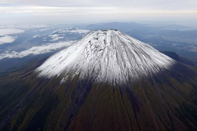 Japan's Mount Fuji Loses Iconic Snow Cap Amid Unprecedented Warm Spell