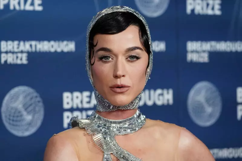 Katy Perry Plants Surprise Kiss on Justin Trudeau During London Show