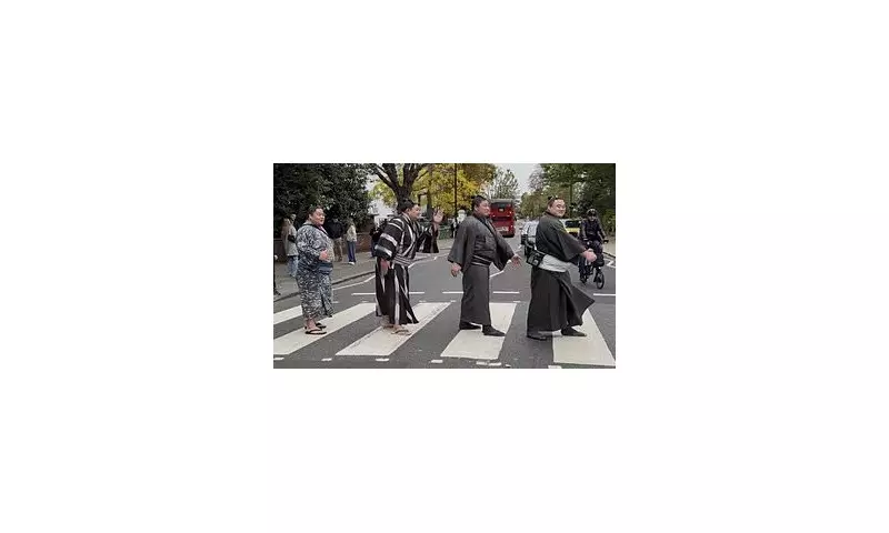 Sumo Wrestlers Recreate Iconic Beatles Abbey Road Crossing in Bizarre London Stunt