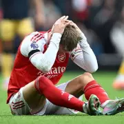 Arsenal Captain Martin Ødegaard Faces Race Against Time for Man City Clash After Injury Scare