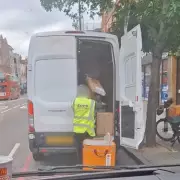 Caught on Camera: Shocking Moment Delivery Driver Appears to Toss Fragile Parcel Over Garden Gate