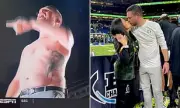College Football World Stunned as Coach's Shirt Removal Reveals Breathtaking Tattoo Masterpiece