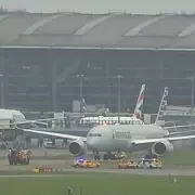 Dramatic Police Standoff at Stansted Airport: Armed Officers Surround Passenger Jet in Major Security Alert