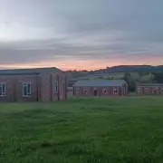 Hundreds of Asylum Seekers Face Return to Controversial Barracks Despite Safety Fears