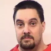 Iowa Man's Door Knock Ends in Tragedy: Teenager Killed in Shocking Shooting Incident