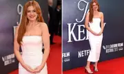 Isla Fisher Stuns in Elegant White Ensemble for Rare Outing with Sacha Baron Cohen